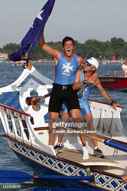 Amalfi celebrate after crossing the line during the Regatta of Ancient Maritime Republics on June 12, 2011 in Venice, Italy. The Regatta of Ancient...