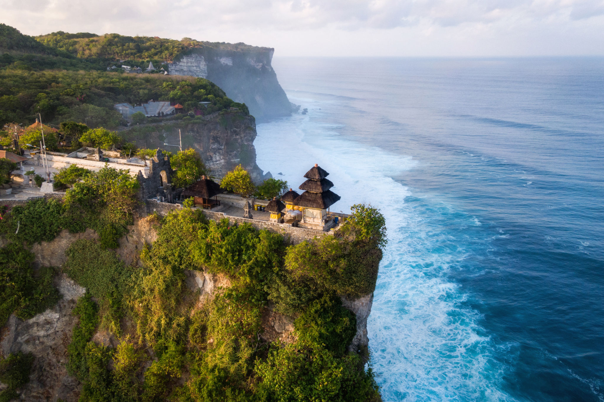Bali, Indonesia, Aerial View of Uluwatu Temple at Sunrise Bali, Indonesia, Aerial View of Uluwatu Temple at Sunrise