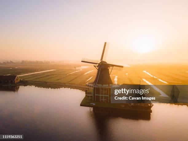 holland windmill in the morning - amsterdam blue sky stock-fotos und bilder