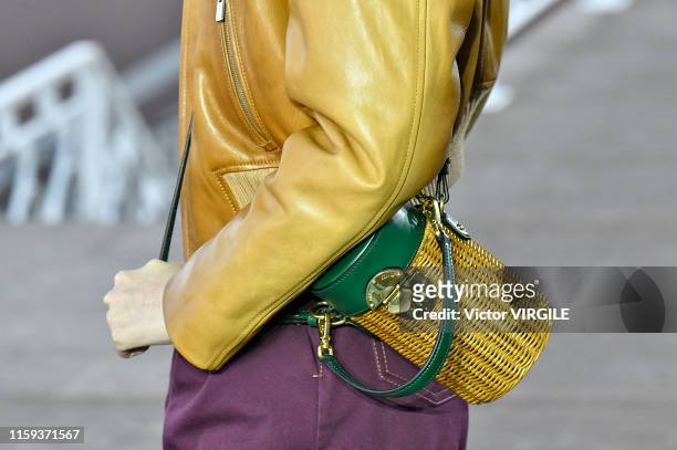 Model walks the runway during the MIU MIU resort Jockey Club Spring/Summer 2020 fashion show at the Hippodrome d'Auteuil on June 29, 2019 in Paris,...