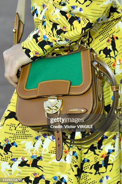 Model walks the runway during the MIU MIU resort Jockey Club Spring/Summer 2020 fashion show at the Hippodrome d'Auteuil on June 29, 2019 in Paris,...