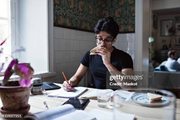 Man Study Table Man Study Table Photos and Premium High Res Pictures - Getty Images