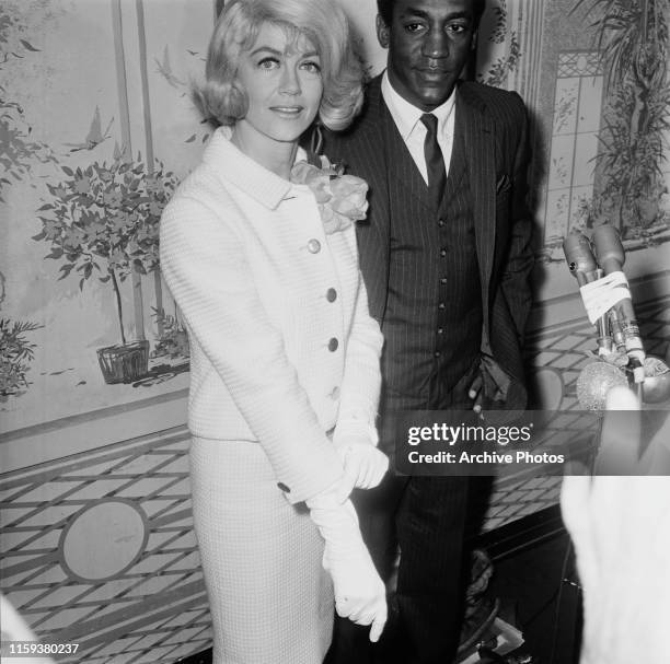 Actors Dorothy Malone and Bill Cosby at the Golden Apple Awards presented by the Hollywood Women's Press Club, USA, 1966.