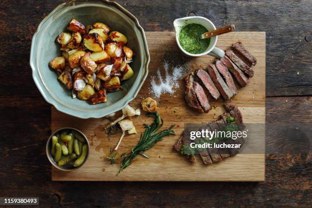 kansas steak with fresh herb sauce and grilled vegetables - pork cuts stock pictures, royalty-free photos & images