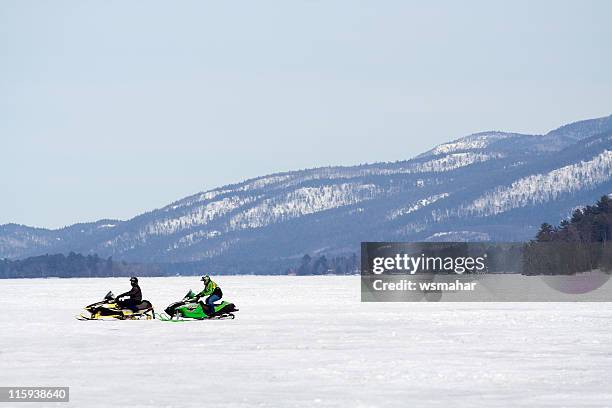 lone schneemobile - adirondack state park stock-fotos und bilder