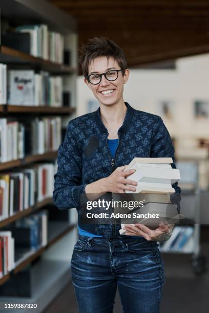 these are all the books i'd like to get through - librarian stock pictures, royalty-free photos & images