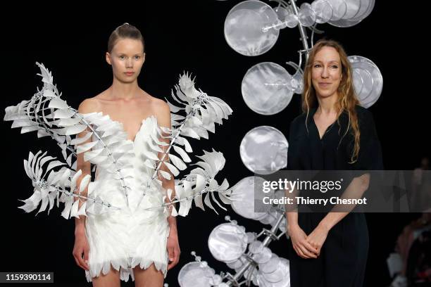 Dutch designer Iris van Herpen acknowledges the audience at the end of the Iris Van Herpen Haute Couture Fall/Winter 2019 2020 show as part of Paris...
