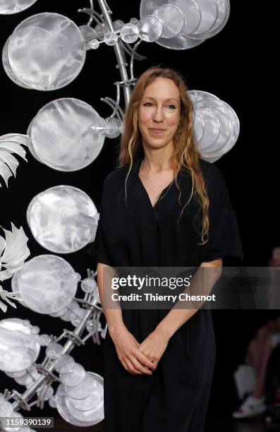 Dutch designer Iris van Herpen acknowledges the audience at the end of the Iris Van Herpen Haute Couture Fall/Winter 2019 2020 show as part of Paris...