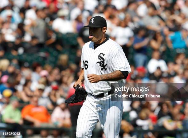 Chicago White Sox relief pitcher Sergio Santos walks from the bullpen to close the game against the Oakland Athletics at U.S. Cellular Field in...