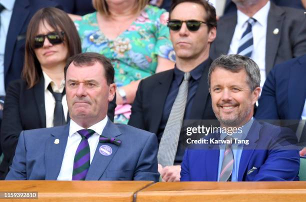 Wimbledon Chairman Philip Brook and Crown Prince Frederik of Denmark attend day 1 of the Wimbledon Tennis Championships at the All England Lawn...