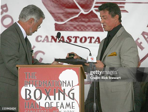 Sylvester Stallone receives his ring during his induction speech at the 2011 International Boxing Hall of Fame Inductions at the International Boxing...