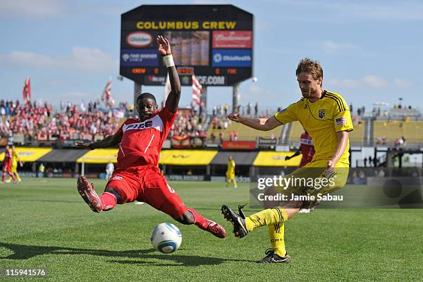 Dominic Oduro of the Chicago Fire attempts to block a shot from Eddie Gaven of the Columbus Crew in the second half on June 12, 2011 at Crew Stadium...