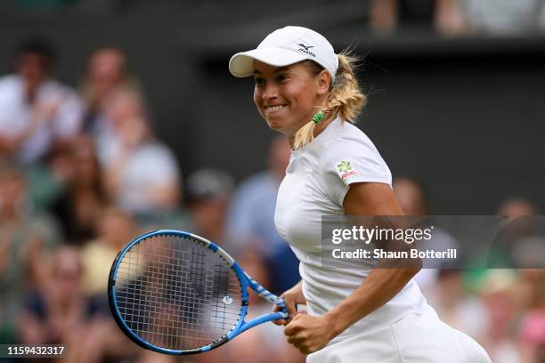 Yulia Putintseva of Kazakhstan celebrates a point in her Ladies' Singles first round match against Naomi Osaka of Japan during Day one of The...