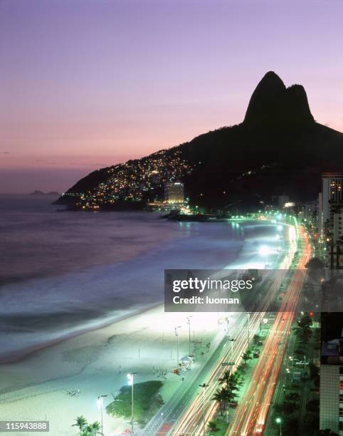 ipanema beach in rio de janeiro - rio de janeiro favela stock pictures, royalty-free photos & images
