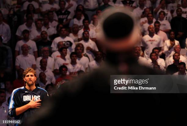 Dirk Nowitzki of the Dallas Mavericks and LeBron James of the Miami Heat stand for the performance of the National Anthem in Game Six of the 2011 NBA...