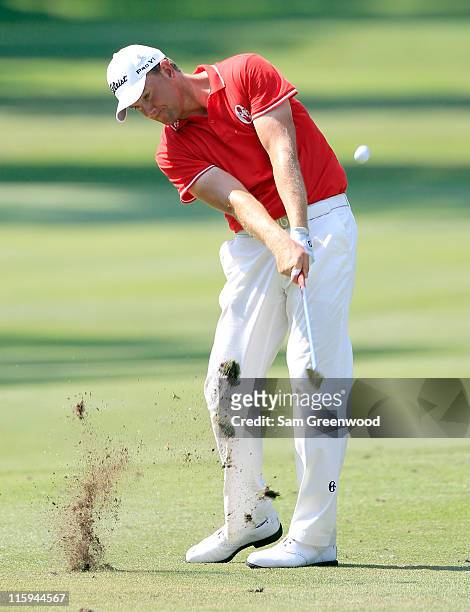 Robert Karlsson of Sweden hits a shot on the 14th hole during the final round of the FedEx St. Jude Classic at TPC Southwind on June 12, 2011 in...