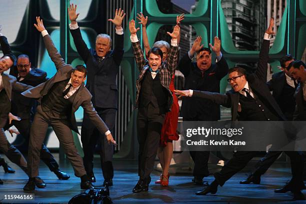 Daniel Radcliffe and the cast of 'How To Succeed in Business Without Really Trying' perform on stagee during the 65th Annual Tony Awards at the...