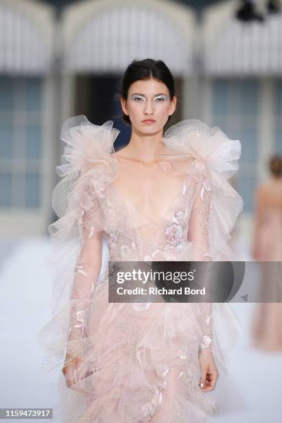 Model walks the runway during the Ralph&Russo Haute Couture Fall/Winter 2019 2020 show as part of Paris Fashion Week on July 01, 2019 in Paris,...