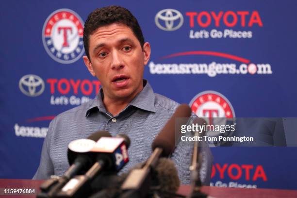 Texas Rangers General Manager Jon Daniels talks with the media following the announcement that the game between the Texas Rangers and the Los Angeles...