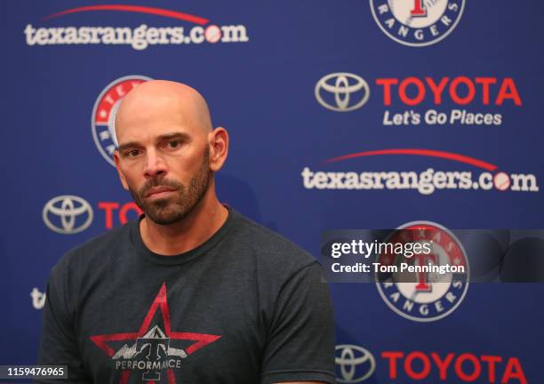 Texas Rangers Manager Chris Woodward talks with the media following the announcement that the game between the Texas Rangers and the Los Angeles...