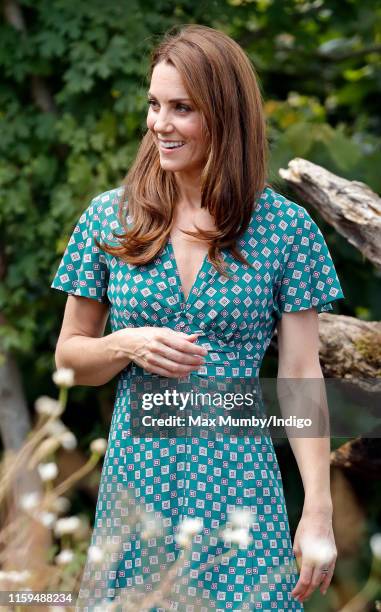 Catherine, Duchess of Cambridge visits the RHS Hampton Court Palace Garden Festival to view the RHS 'Back to Nature Garden' which she co-designed at...