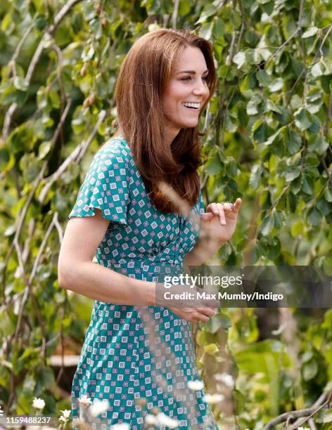 Catherine, Duchess of Cambridge visits the RHS Hampton Court Palace Garden Festival to view the RHS 'Back to Nature Garden' which she co-designed at...