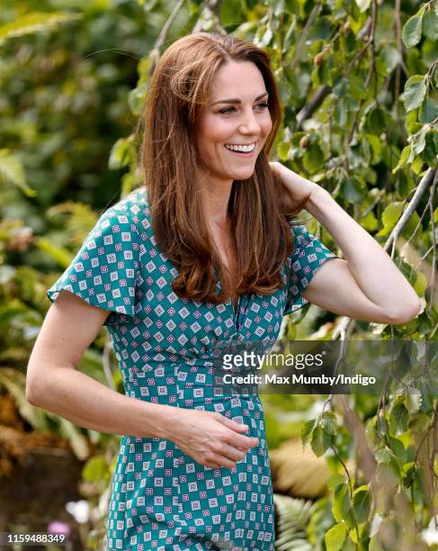 Catherine, Duchess of Cambridge visits the RHS Hampton Court Palace Garden Festival to view the RHS 'Back to Nature Garden' which she co-designed at...