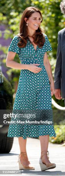 Catherine, Duchess of Cambridge visits the RHS Hampton Court Palace Garden Festival to view the RHS 'Back to Nature Garden' which she co-designed at...