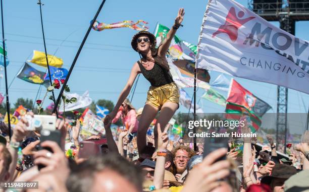 Festival goers enjoy the music during day ficeof Glastonbury Festival at Worthy Farm, Pilton on June 29, 2019 in Glastonbury, England.