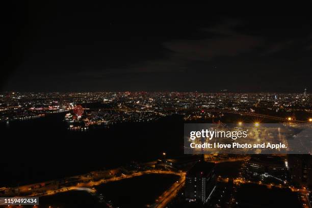 night view from osaka prefectural government sakishima building - osaka world's fair stock pictures, royalty-free photos & images