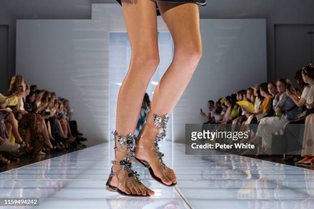Model, shoe detail, walks the runway during the Azzaro Couture Haute Couture Fall/Winter 2019 2020 show as part of Paris Fashion Week on July 01,...