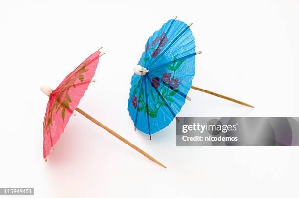 two party umbrellas - paper umbrella stock pictures, royalty-free photos & images