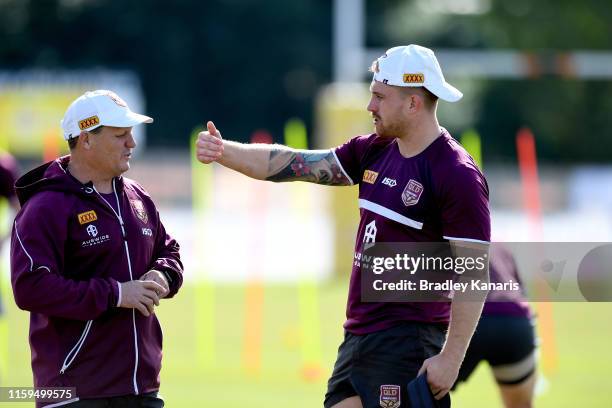 Cameron Munster talks tactics with Coach Kevin Walters during a Queensland Maroons State of Origin training session at Langlands Park on July 02,...