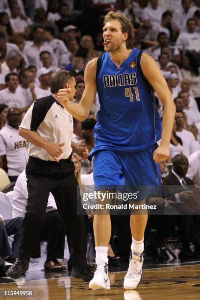 Dirk Nowitzki of the Dallas Mavericks reacts after making a jump shot in the fourth quarter while taking on the Miami Heat in Game Six of the 2011...