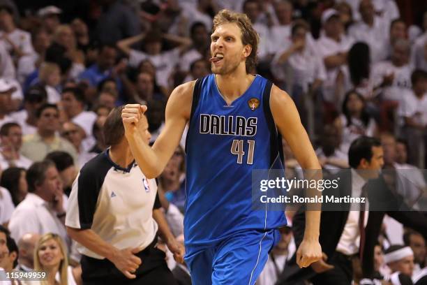 Dirk Nowitzki of the Dallas Mavericks reacts after making a jump shot in the fourth quarter while taking on the Miami Heat in Game Six of the 2011...