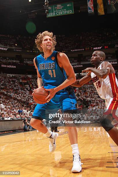 Dirk Nowitzki of the Dallas Mavericks drives to the basket against Joel Anthony of the Miami Heat during Game Six of the 2011 NBA Finals on June 12,...