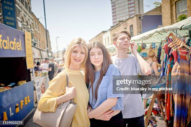 a mother and her two teenagers hanging out - hackney weekend stock pictures, royalty-free photos & images