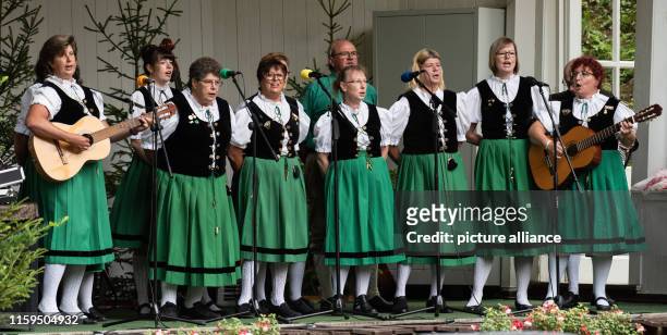 August 2019, Lower Saxony, Clausthal-Zellerfeld: The home group from Buntenbock is on stage in the yodel competition in the Harz mountains. The yodel...