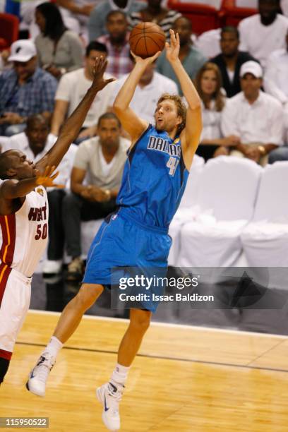 Dirk Nowitzki of the Dallas Mavericks shoots against Joel Anthony of the Miami Heat during Game Six of the 2011 NBA Finals on June 12, 2011 at the...