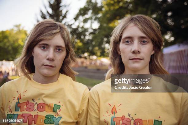 Identical twins attend the Twins Days Festival at Glenn Chamberlin Park on August 3, 2019 in Twinsburg, Ohio. Twins Day celebrates biological twins...