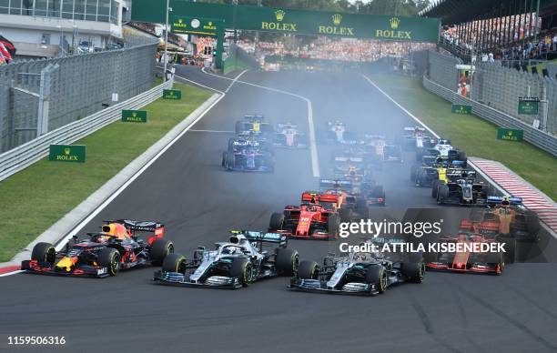 Red Bull's Dutch driver Max Verstappen starts the race from the pole position during the Formula One Hungarian Grand Prix at the Hungaroring circuit...