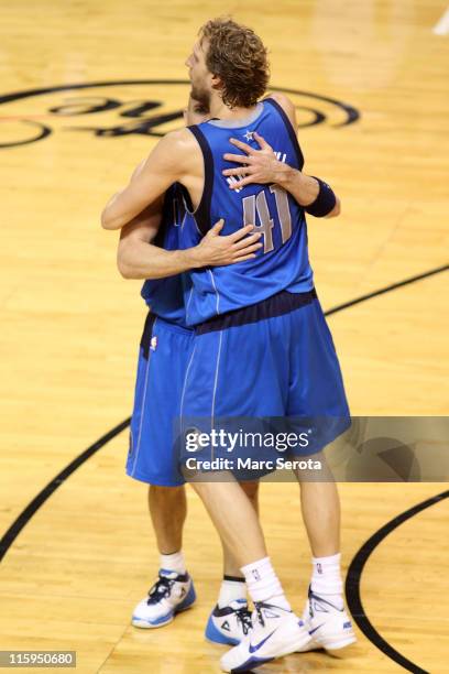 Jason Kidd and Dirk Nowitzki of the Dallas Mavericks celebrate after they won 105-95 against the Miami Heat in Game Six of the 2011 NBA Finals at...