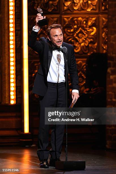 Winner of Best Performance by an Actor in a Leading Role in a Musical Norbert Leo Butz speaks on stage during the 65th Annual Tony Awards at the...