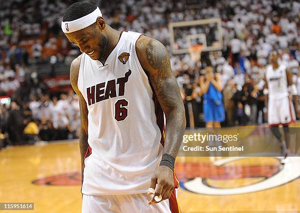 LeBron James of the Heat walks off the court at the end of Game 6 of the NBA Finals at the AmericanAirlines Arena in Miami, Florida, Sunday, June 12,...