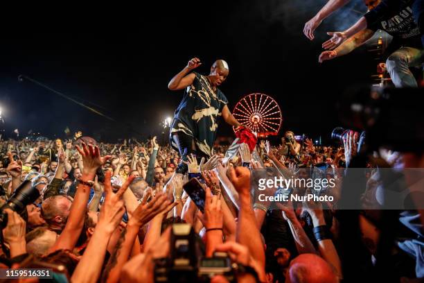 Skunk Anansie leader walks down the stage and greets the crowd during their concert on the main stage of the 25th PolnRock music festival in Kostrzyn...