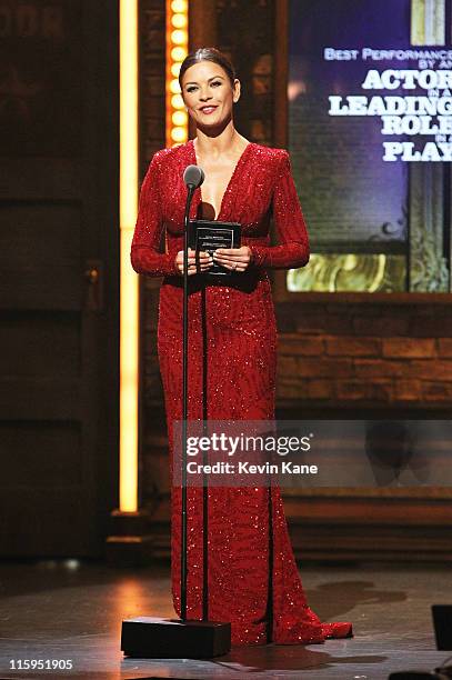 Catherine Zeta-Jones speaks on stage during the 65th Annual Tony Awards at the Beacon Theatre on June 12, 2011 in New York City.