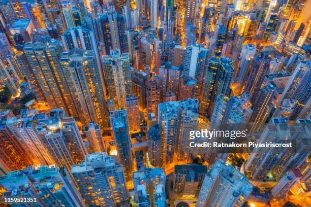 aerial view of hong kong downtown, republic of china. financial district and business centers in smart city in asia. top view of skyscraper and high-rise buildings - china economy stockfoto's en -beelden