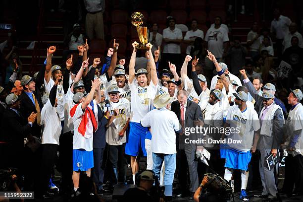 Dirk Nowitzki and the Dallas Mavericks celebrate after winning Game Six of the 2011 NBA Finals on June 12, 2011 at the American Airlines Arena in...