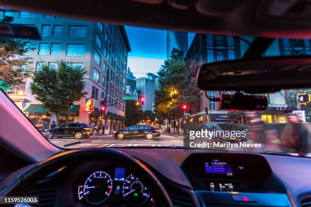 driver point of view of the city night life - "marilyn nieves" stock pictures, royalty-free photos & images
