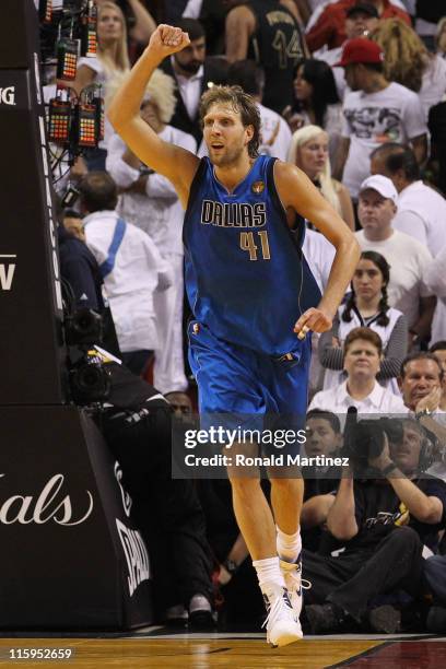 Dirk Nowitzki of the Dallas Mavericks celebrates while taking on the Miami Heat in the fourth quarter in Game Six of the 2011 NBA Finals at American...